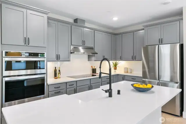 Spacious kitchen with Quartz countertops and new appliances