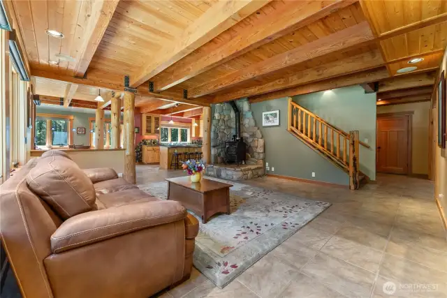 Cozy wood stove on rock hearth adds ambiance & charm