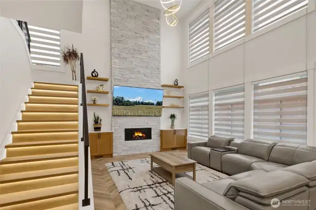 stacked stone gas fireplace that is floor to ceiling