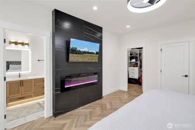 Primary bedroom with walk in closet and bathroom