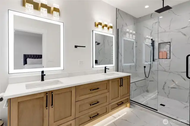 Primary bathroom with walk in tiled shower