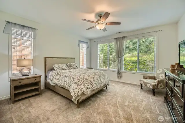 oversized main bedroom with brand new carpet installed for new home owner