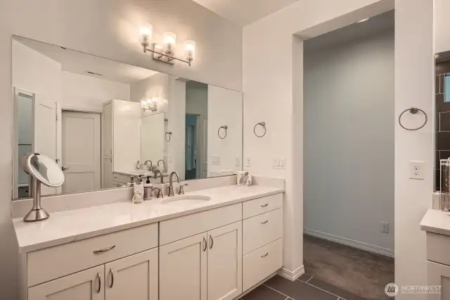 Two separate vanity areas with separate sinks