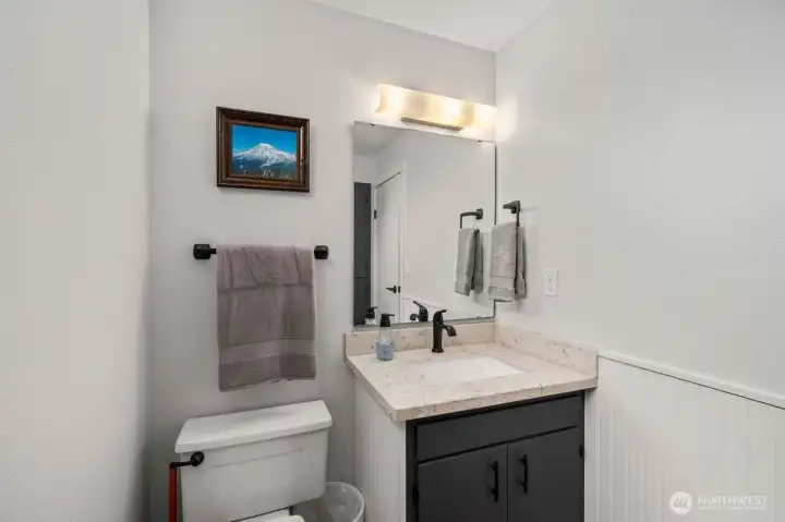 Updated primary bath with walk in shower.