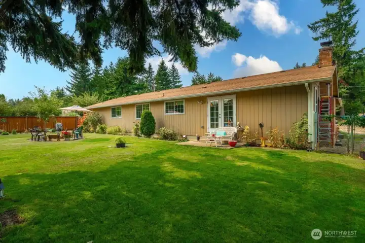 You will love this serene back yard.  Plenty of room for all the fun or just sit back and enjoy the quiet.