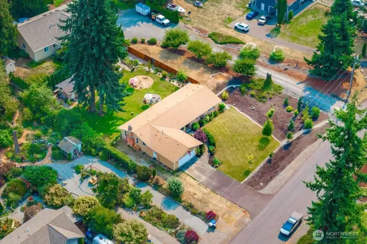 Check out the large RV parking on the side of the house with its own designated plugin. NO HOA's!