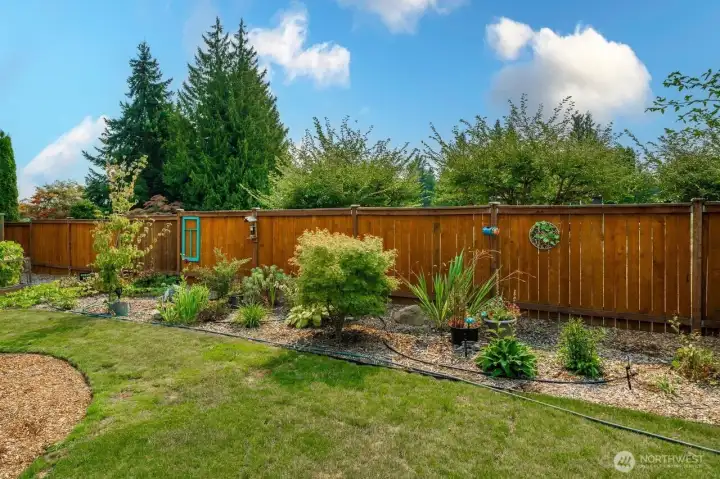 Fenced and gated, so many unique plantings you will be amazed.