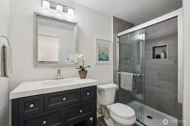 Ensuite 3/4 bathroom off of the primary.