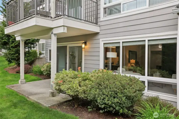 Nestled back away from the street at garden level for peaceful green views every day!
