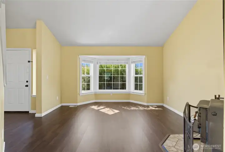 The formal living room is the place to host guests and also lets you step away from the bustle of the kitchen and Great Room area.