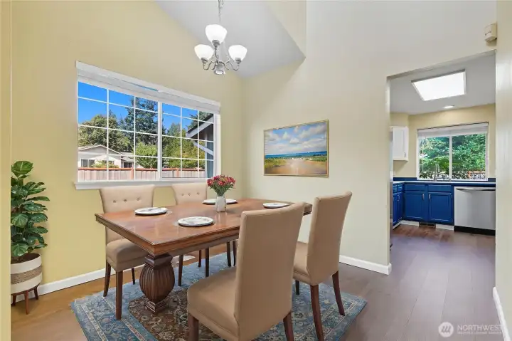 The formal dining area is the ideal place to gather for entertaining. This home is virtually staged.