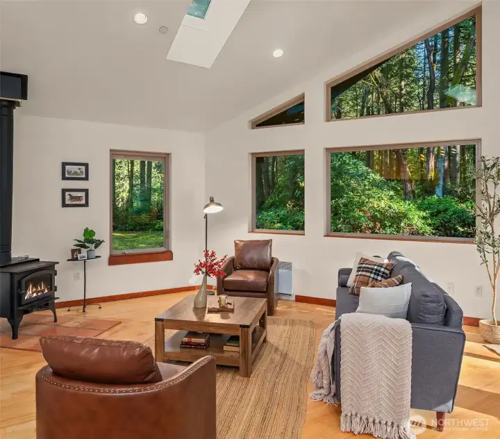 This great room enjoys so much light with banks of big windows and multiple skylights. This one-owner home was thoughtfully designed and lovingly built.