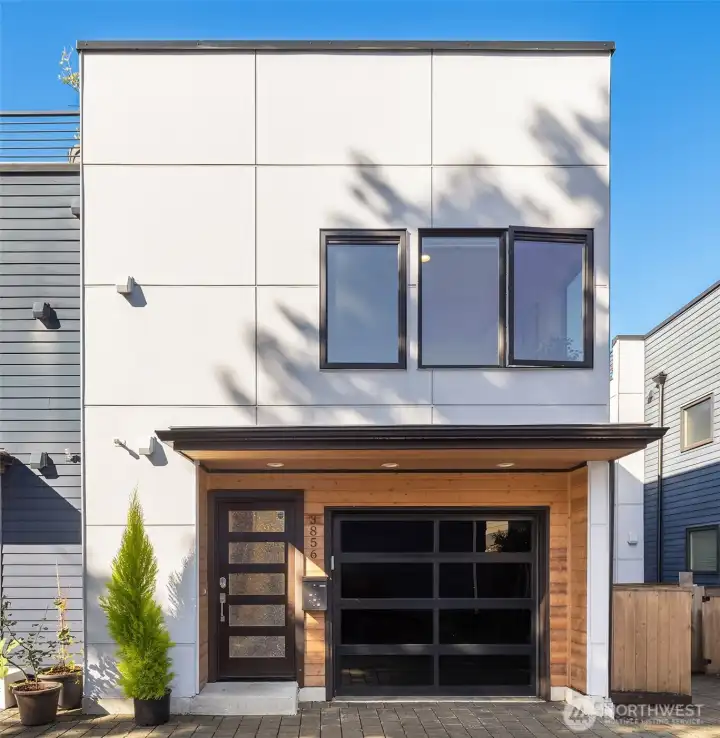 Easy entry on alley side, with garage plus 1 parking space in front of garage