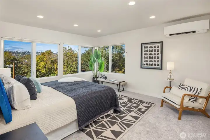 Primary bedroom with sweeping views