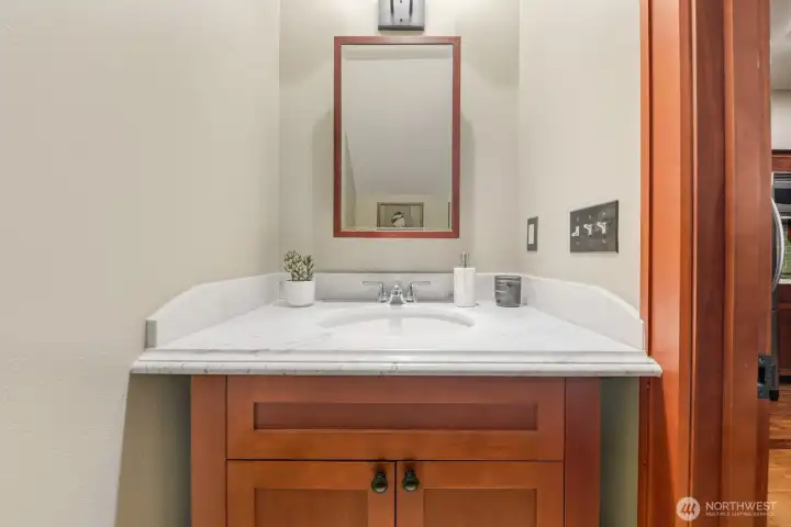 Main level half bathroom.