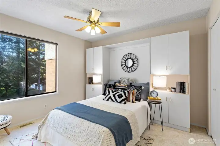 This well-installed, "built-in" murphy bed enhances this home's value by adding greater efficiency and multi-functionality of space. This room can flex by day as a home office and as a guest bedroom by night.