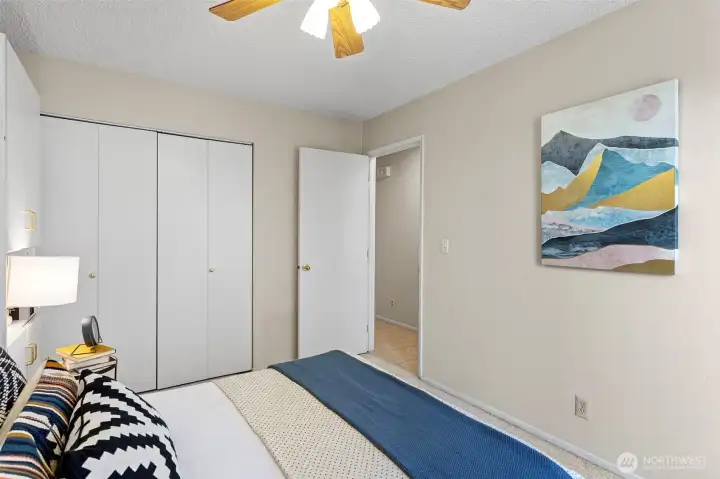 The second bedroom features a large closet for additional storage or extending the flexible footprint of this room.
