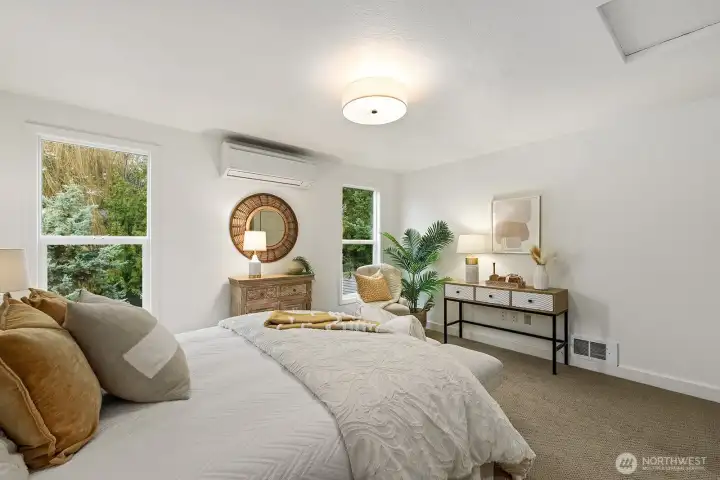 Primary bedroom that overlooks back patio.