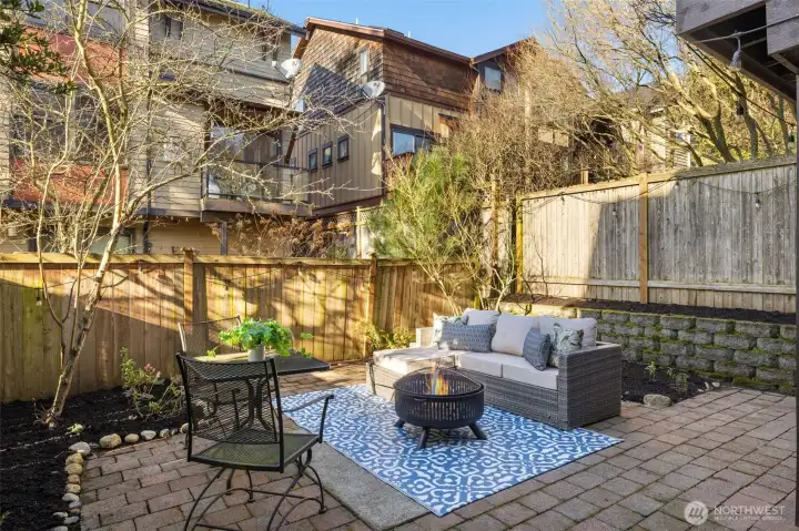 Fully-fenced in private backyard with gardening space. Hot tub electrical already in place.