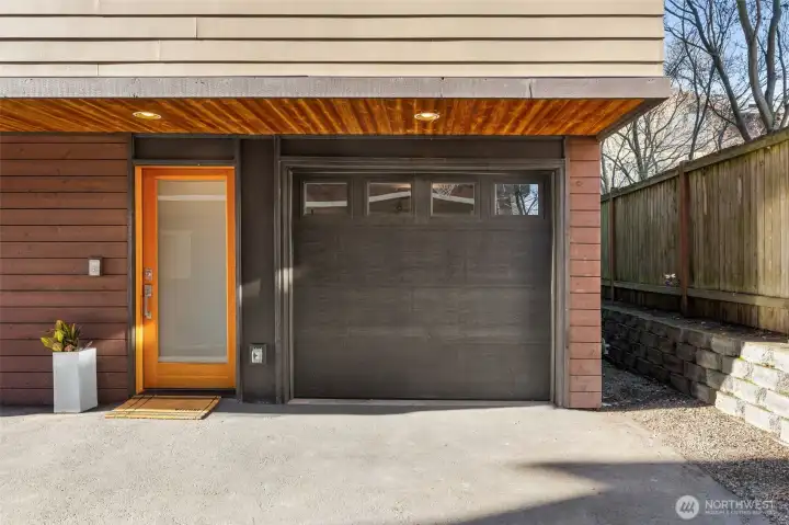 Complete with a extra deep garage and a fully-fenced-in backyard.