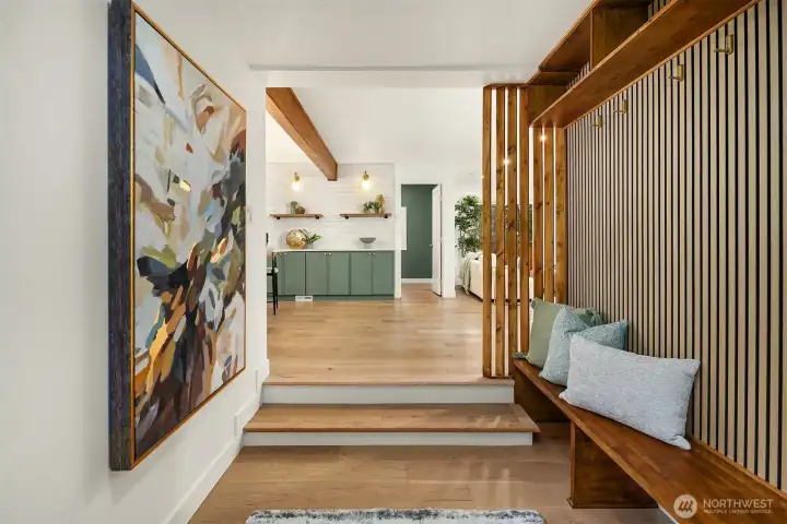 Entrance room designed to allow ease of show removal and storage, and prevent tracking of dirt into the home.