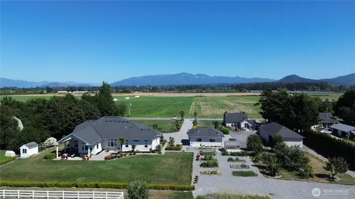 (From the left) Main home, detached garage (2 bays), second home, detached garage (4 bays)