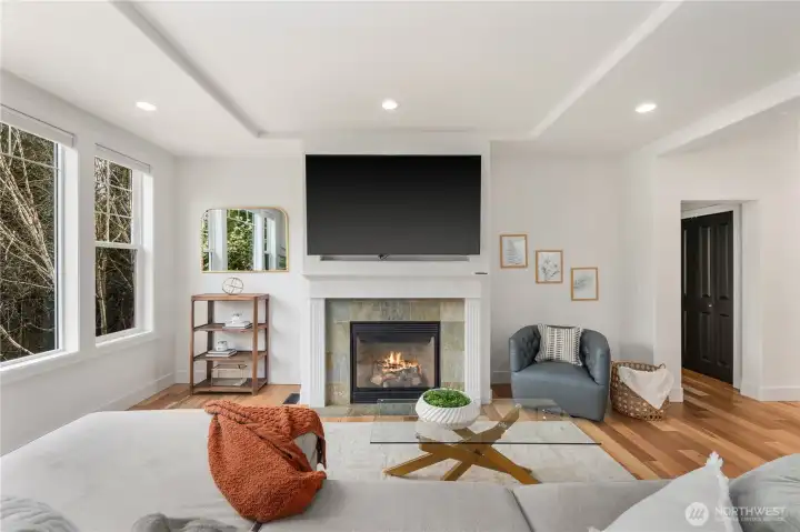 Tray and beam ceilings add archtictural detail and extra height to the rooms (Attached TV Does Not Convey)