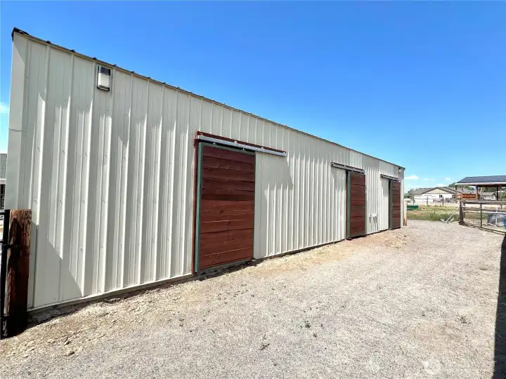 3 run-out stalls off the large shop.