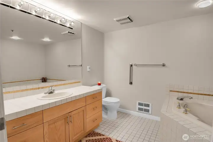 Primary bathroom adjacent to primary bedroom