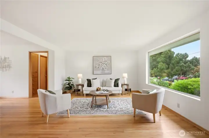 The west facing living room gets great light with a west facing picture window.