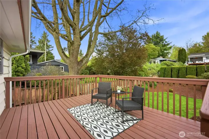 The beautiful freshly stained back deck offers the opportunity for outdoor dining or relaxation.