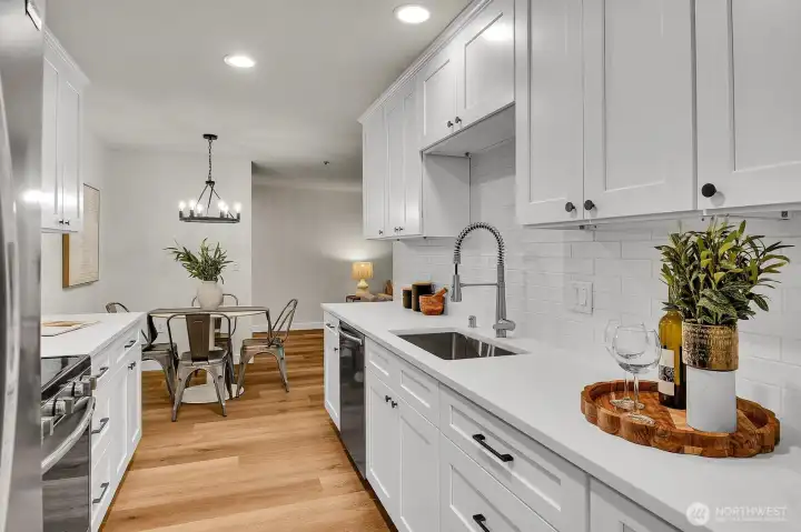 Clean, modern kitchen layout offering ample prep space.