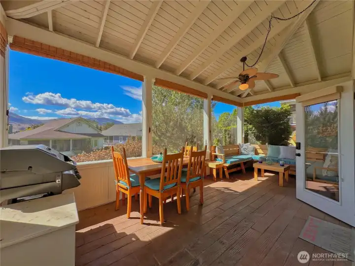 Enjoy 540sf of outdoor living with a charming wraparound veranda and patio overlooking expansive greenspace. Enjoy 540sf of outdoor living with a charming wraparound veranda and patio overlooking expansive greenspace.