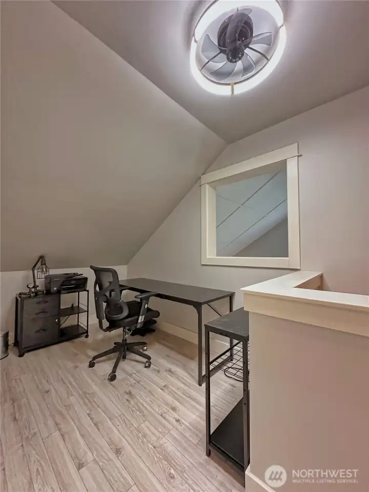 Versatile landing area offers flexible space for a reading nook, office, or additional lounge area. Versatile landing area offers flexible space for a reading nook, office, or additional lounge area.