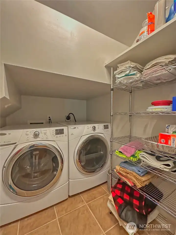 Laundry room has storage for all you want hidden away. Laundry room has storage for all you want hidden away.