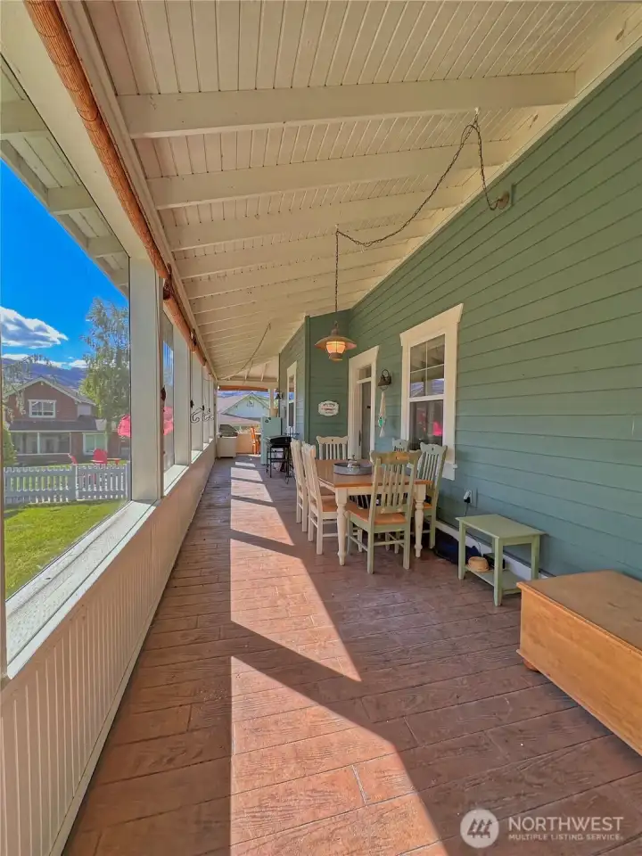Bright and airy enclosed veranda accommodates multiple seating and dining spaces for easy entertaining plus plenty of recreation storage. Bright and airy enclosed veranda accommodates multiple seating and dining spaces for easy entertaining plus plenty of recreation storage.