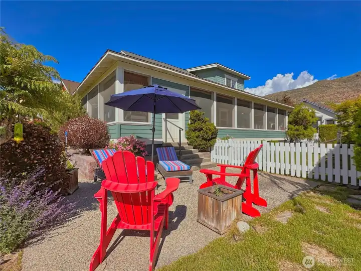 The inviting patio and fenced side yard create the perfect setting for outdoor relaxation and pet-friendly living. The inviting patio and fenced side yard create the perfect setting for outdoor relaxation and pet-friendly living.