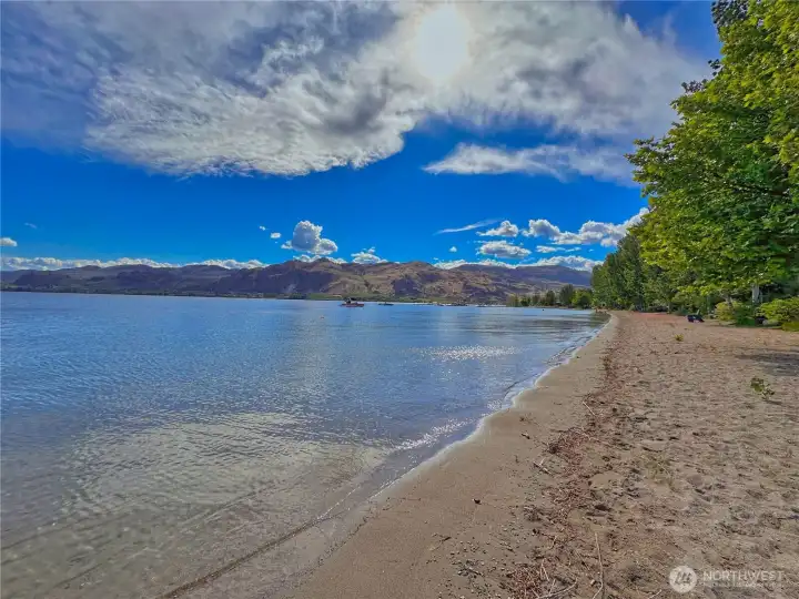 A mile of serene beachfront along Lake Osoyoos creates an unmatched setting for peaceful lakeside enjoyment. A mile of serene beachfront along Lake Osoyoos creates an unmatched setting for peaceful lakeside enjoyment.