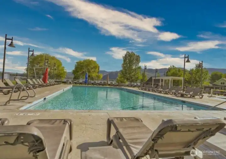 A beautifully maintained 30x60 heated pool enhances the community with resort-style amenities. A beautifully maintained 30x60 heated pool enhances the community with resort-style amenities.