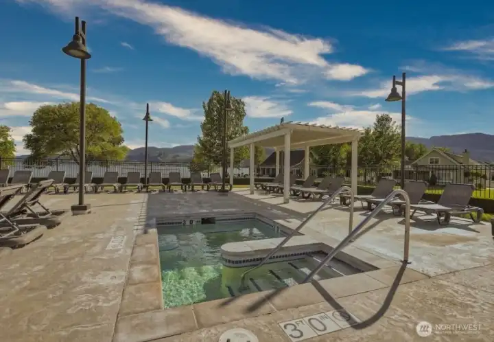 An onsite hot tub offers a peaceful retreat just steps from home. An onsite hot tub offers a peaceful retreat just steps from home.
