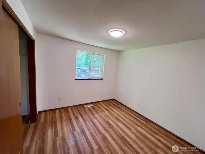 3rd of three bedrooms with nice hard surface flooring