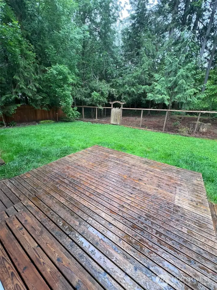 Spacious deck is great for entertaining or just hanging out with a coffee and a good book.