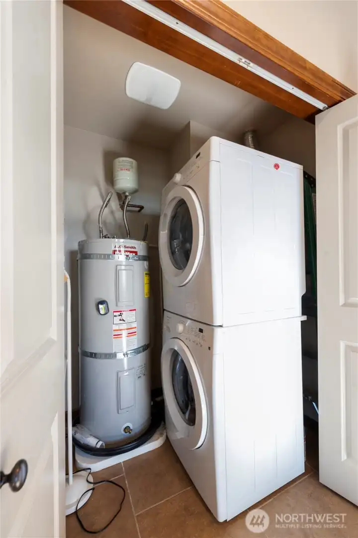 In unit washer/dryer + hot water tank