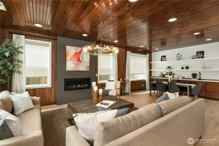 Open concept great room has beautiful hardwood ceilings, contemporary fireplace, upgraded lighting, built in china cabinet and shelving. With designer blinds and drapes. Open concept great room has beautiful hardwood ceilings, contemporary fireplace, upgraded lighting, built in china cabinet and shelving. With designer blinds and drapes.