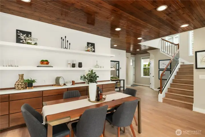 Built in shelving and designer cabinets for storage in the dining room space. Built in shelving and designer cabinets for storage in the dining room space.
