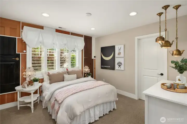 Bedroom 3 with designer wall treatments and custom lighting. Bedroom 3 with designer wall treatments and custom lighting.