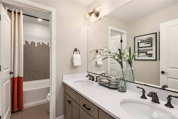 Upstairs hall bathroom. Upstairs hall bathroom.