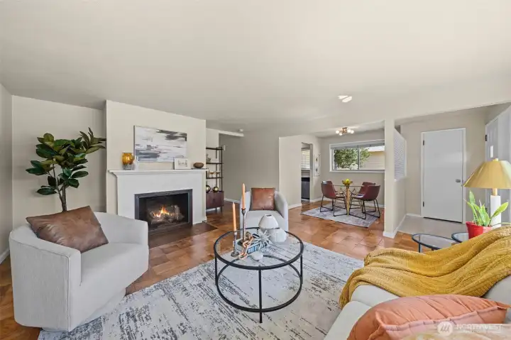 An open flow between the living and dining areas makes everyday living and entertaining easy. An open flow between the living and dining areas makes everyday living and entertaining easy.