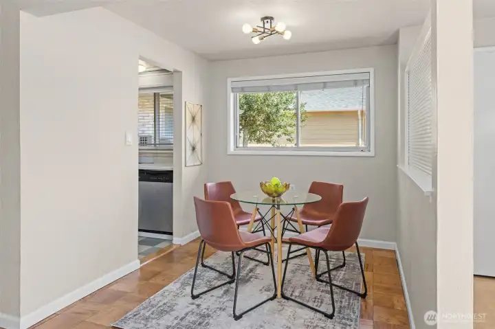 The dining area connects seamlessly to both the living room and kitchen. The dining area connects seamlessly to both the living room and kitchen.