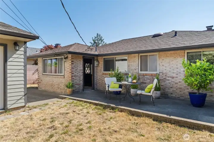 Step outside to a private patio overlooking the fully fenced backyard. Step outside to a private patio overlooking the fully fenced backyard.